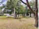 Wooded backyard with mature trees and landscaping at 8707 Sw 88Th Court Rd # B, Ocala, FL 34481