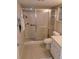 Bathroom with walk-in shower and updated vanity at 8707 Sw 88Th Court Rd # B, Ocala, FL 34481