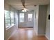 Bright dining area with wood floors and outdoor access at 8707 Sw 88Th Court Rd # B, Ocala, FL 34481