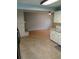 Kitchen with a view into the living room and brick fireplace at 8707 Sw 88Th Court Rd # B, Ocala, FL 34481