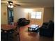 Spacious living room with hardwood floors and dining area at 8707 Sw 88Th Court Rd # B, Ocala, FL 34481