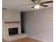 Living room with brick fireplace and hardwood floors at 8707 Sw 88Th Court Rd # B, Ocala, FL 34481