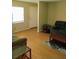 Living room with wood floors and entryway access at 8707 Sw 88Th Court Rd # B, Ocala, FL 34481