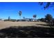 Expansive backyard with manicured lawn, fenced perimeter, and a screened-in pool enclosure at 9340 Sw 9Th Ter, Ocala, FL 34476