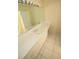 Bathroom featuring an extended white countertop, vanity with sink, and ceramic tile flooring at 9340 Sw 9Th Ter, Ocala, FL 34476