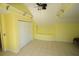Bright bedroom with yellow walls and tile floors at 9340 Sw 9Th Ter, Ocala, FL 34476