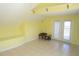 Bonus room with vaulted ceiling, tile floor, and built-in shelving at 9340 Sw 9Th Ter, Ocala, FL 34476
