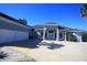 Stunning home with a large driveway and mature trees at 9340 Sw 9Th Ter, Ocala, FL 34476