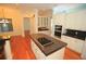 Kitchen with an island cooktop, hardwood floors, and stainless steel appliances at 9340 Sw 9Th Ter, Ocala, FL 34476