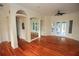 Open living area with beautiful hardwood floors, arched doorways, recessed lighting and view of the outdoors at 9340 Sw 9Th Ter, Ocala, FL 34476