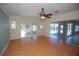 Open living room with sliding glass doors to the screened lanai, and tile flooring at 9340 Sw 9Th Ter, Ocala, FL 34476