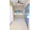 Sunroom with tile floors, pool view, and sliding doors at 9340 Sw 9Th Ter, Ocala, FL 34476