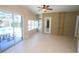 Sunroom with pool view, tile floors, and sliding glass doors at 9340 Sw 9Th Ter, Ocala, FL 34476