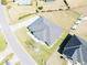 Single-story home with gray roof, situated on a large lot at 9645 Se 61St Ter, Belleview, FL 34420