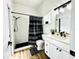 Modern bathroom with a walk-in shower and white subway tile at 9645 Se 61St Ter, Belleview, FL 34420