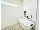 Relaxing bathroom with soaking tub, tiled shower, and modern fixtures at 9645 Se 61St Ter, Belleview, FL 34420