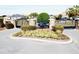 Entrance to the Fountains community with stone pillars and wrought iron gates at 9645 Se 61St Ter, Belleview, FL 34420