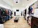 Large walk-in closet with ample shelving and hanging space at 9645 Se 61St Ter, Belleview, FL 34420