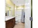 Clean bathroom with tub shower combination and vanity at 9958 Sw 97Th Ln, Ocala, FL 34481