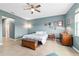 Spacious bedroom with ample natural light and ceiling fan at 9958 Sw 97Th Ln, Ocala, FL 34481
