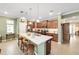 Modern kitchen with island and stainless steel appliances at 9958 Sw 97Th Ln, Ocala, FL 34481