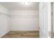 Large walk-in closet with wire shelving at 10120 Se 130Th St, Belleview, FL 34420