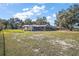 Spacious backyard with lake views at 10455 Se 143Rd St, Summerfield, FL 34491