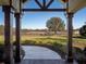 View of the backyard with a horse farm visible at 11130 W Highway 326, Ocala, FL 34482