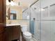 Clean bathroom with a walk-in shower and single vanity at 11130 W Highway 326, Ocala, FL 34482