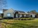 House exterior showcasing a large covered porch at 11130 W Highway 326, Ocala, FL 34482