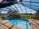 Inviting screened pool with spa and ample patio space at 11130 W Highway 326, Ocala, FL 34482