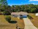 House with a large yard and driveway at 11250 Sw 79Th Ter, Ocala, FL 34476