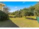 Large backyard with mature trees and open space at 11250 Sw 79Th Ter, Ocala, FL 34476