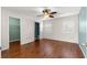 Bedroom with hardwood floors and ceiling fan at 11250 Sw 79Th Ter, Ocala, FL 34476