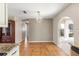 Bright dining room with tile floors and an arched doorway at 11250 Sw 79Th Ter, Ocala, FL 34476