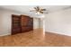 Living room showcasing built-in cabinetry and tile floors at 11250 Sw 79Th Ter, Ocala, FL 34476