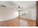 Bright living room featuring tile floors and a ceiling fan at 11250 Sw 79Th Ter, Ocala, FL 34476