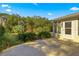 Patio with view of backyard and trees at 11250 Sw 79Th Ter, Ocala, FL 34476