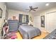 Simple bedroom with a queen bed and ceiling fan at 1209 Se 17Th Ave, Ocala, FL 34471