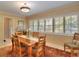 Bright dining room featuring a wood table and chair set at 1209 Se 17Th Ave, Ocala, FL 34471