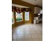 Bright dining area with tile floor and bay window at 13981 Se 86Th Cir, Summerfield, FL 34491