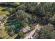 Aerial view of tennis courts, basketball court, and putting green at 13981 Se 86Th Cir, Summerfield, FL 34491