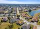 Aerial view showcasing home's location in a community by a lake at 17385 Se 110Th Ter, Summerfield, FL 34491