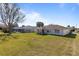 Expansive backyard offering privacy and a view of a neighboring house at 17385 Se 110Th Ter, Summerfield, FL 34491