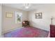 Bright bedroom with carpet, window, and decorative rug at 17385 Se 110Th Ter, Summerfield, FL 34491