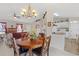 Bright dining room adjacent to the kitchen and living room at 17385 Se 110Th Ter, Summerfield, FL 34491