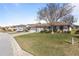 House exterior showcasing a well-maintained lawn and driveway at 17385 Se 110Th Ter, Summerfield, FL 34491