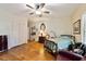 Bedroom with hardwood floors, built-in closet, and a comfortable bed at 1758 Se 7Th St, Ocala, FL 34471