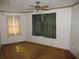 Bright bedroom with ample natural light and neutral carpeting at 18782 Se 50Th St, Ocklawaha, FL 32179