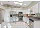 Modern kitchen with stainless steel appliances and ample counter space at 1904 Tweed Ct, Leesburg, FL 34788